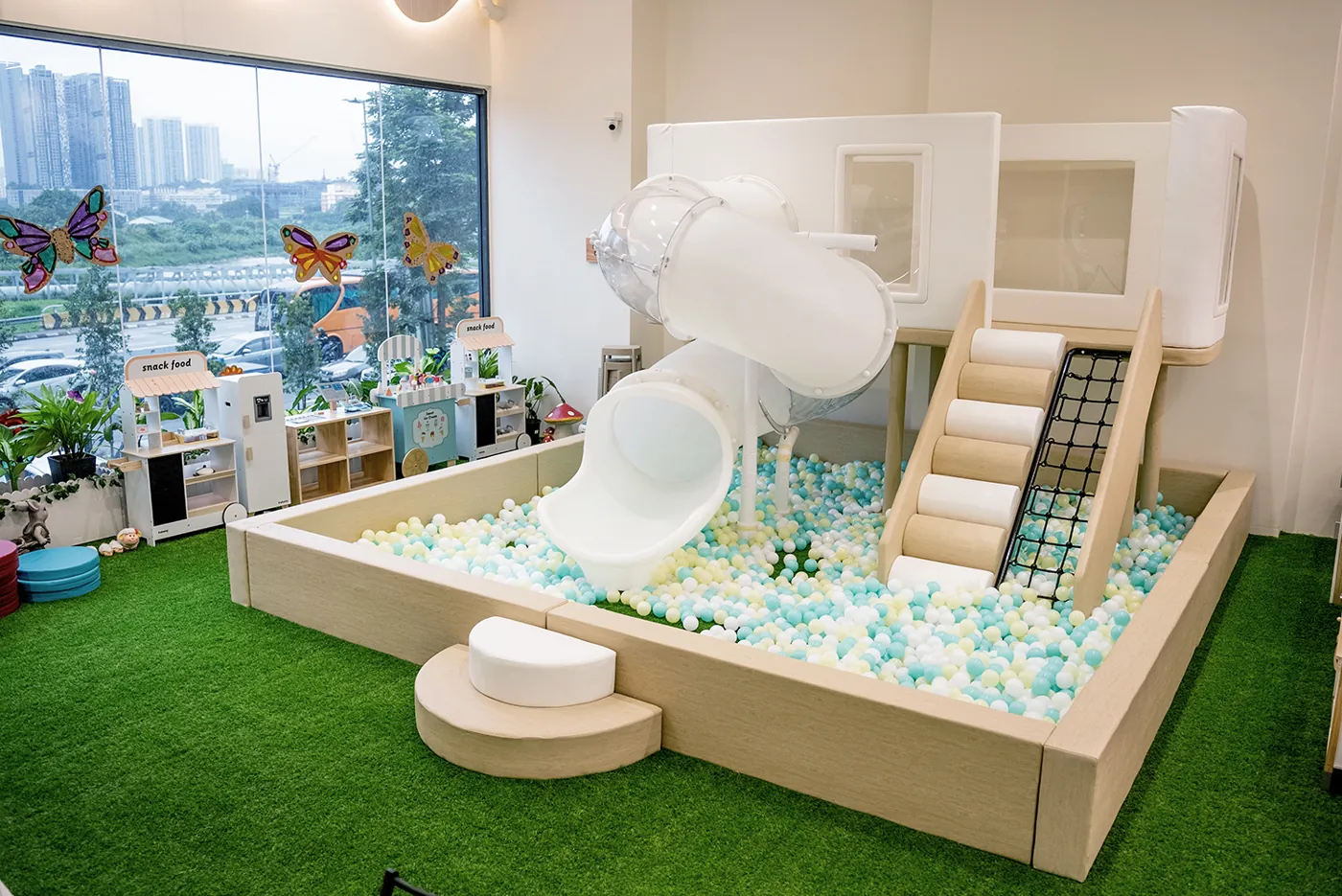 Indoor playground with slide and ball pit